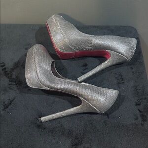Paris Hilton Shimmering Silver Pumps
